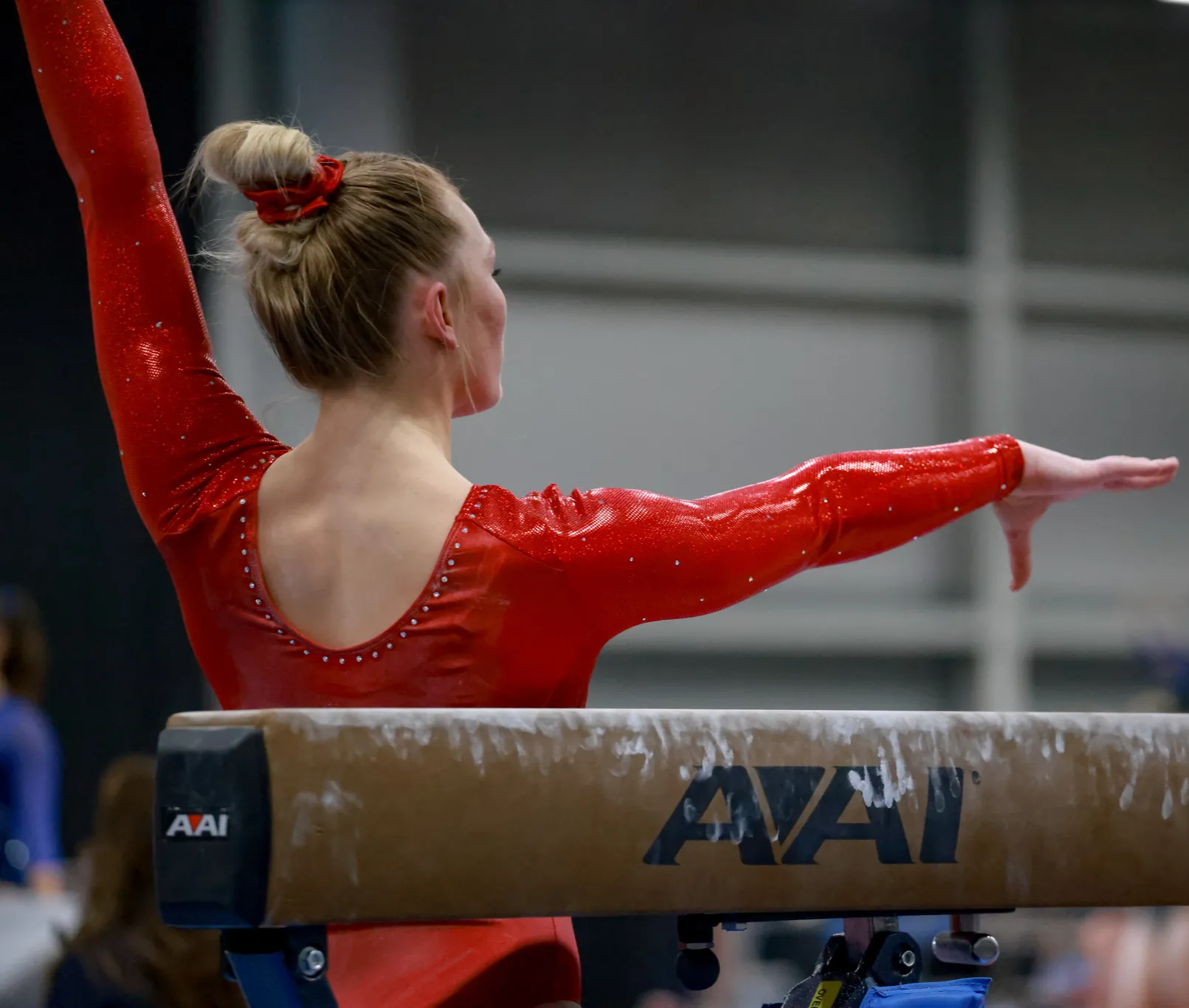 Chow's gymnast competing on beam